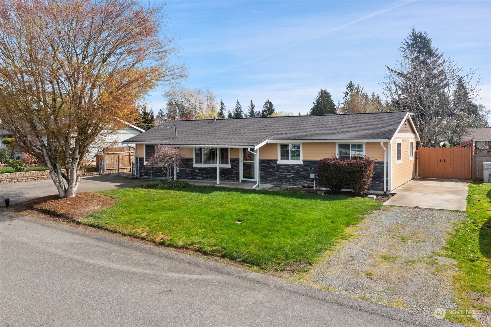 12645 Southeast 170th Street Renton, WA 98058 - Photo 33 of 37 front view of a house with a yard