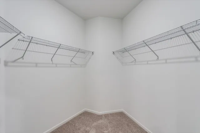 a view of a room with racks on the wall