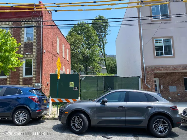 a car parked in front of a house