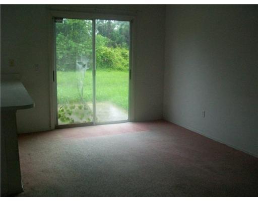 2120 Southwest Vista Road Port St. Lucie, FL 34953 - Photo 3 of 3 a view of a room that has a window in it