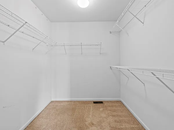 a view of a room with racks on the wall