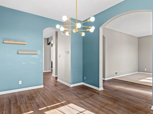 a view of a livingroom with wooden floor
