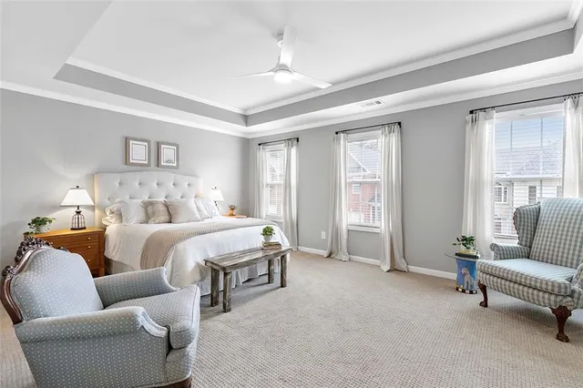 a bedroom with furniture and a couch