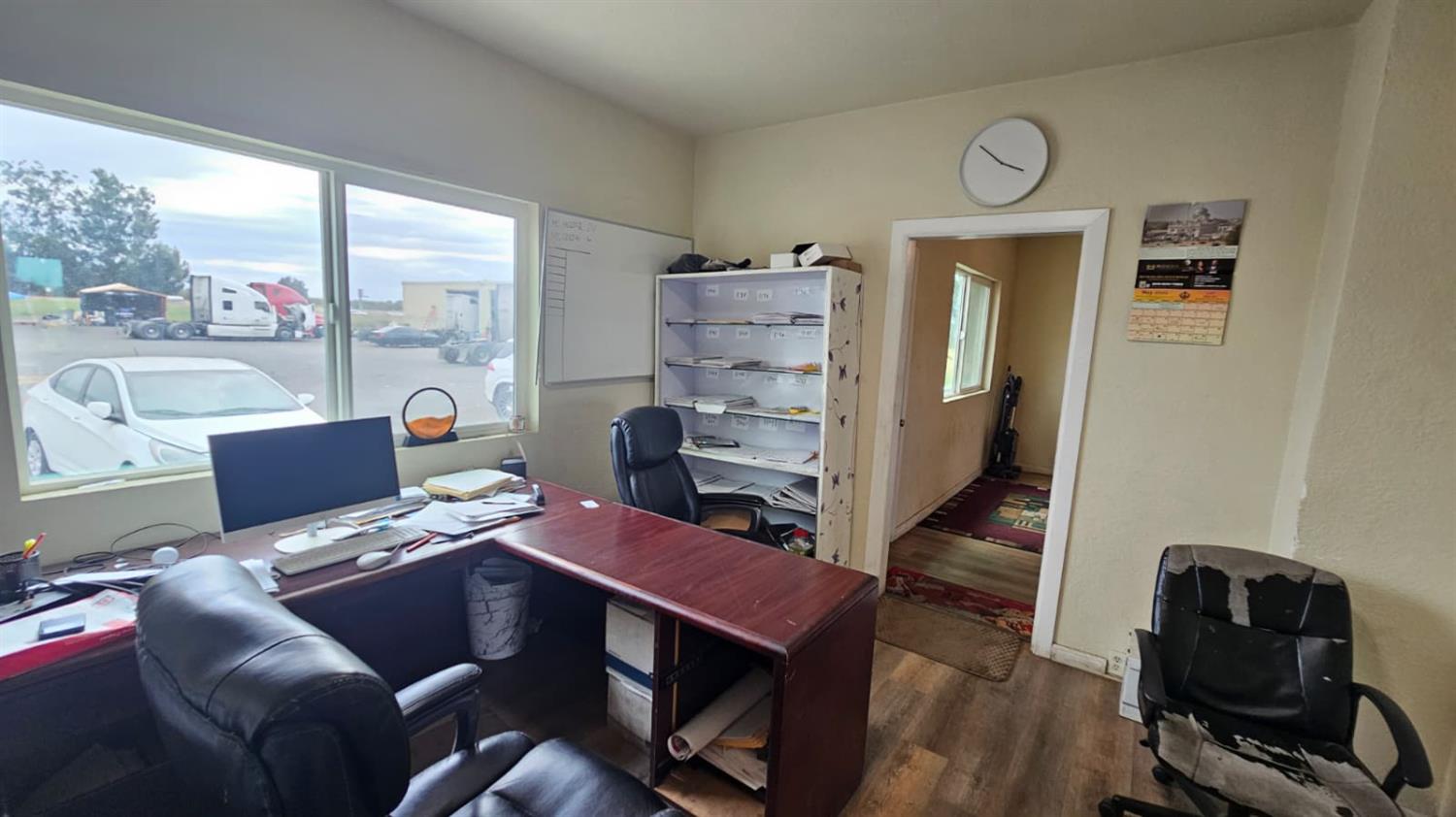 11881 Griffith Road Turlock, CA 95380 - Photo 11 of 42 a view of a workspace with furniture and a window