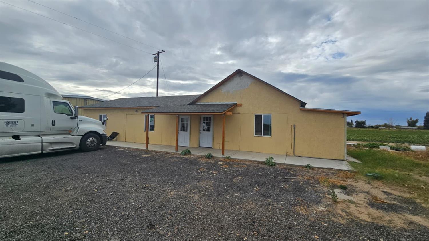 11881 Griffith Road Turlock, CA 95380 - Photo 20 of 42 a view of a house with a outdoor space