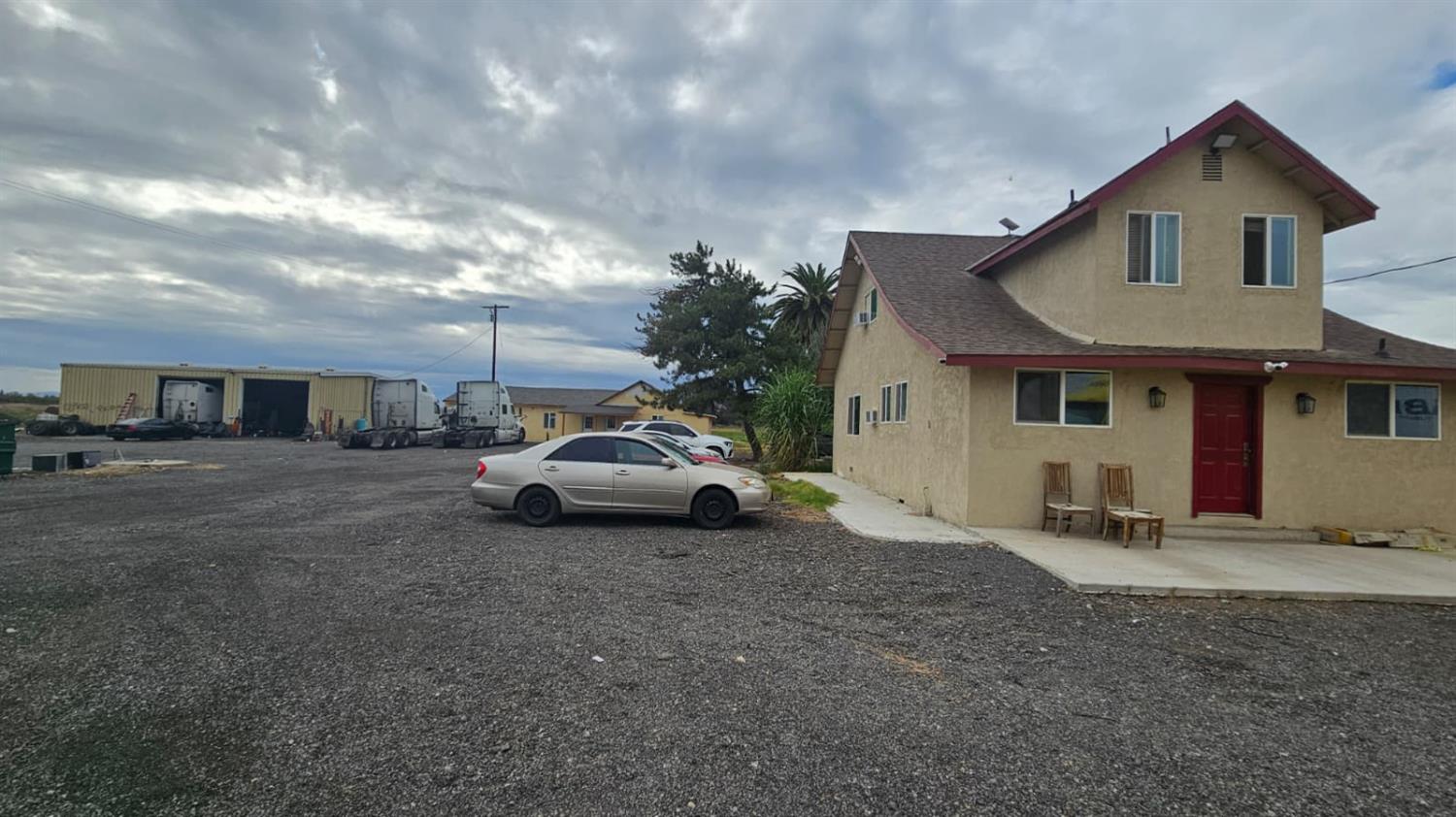 11881 Griffith Road Turlock, CA 95380 - Photo 2 of 42 a view of a car park in front of house
