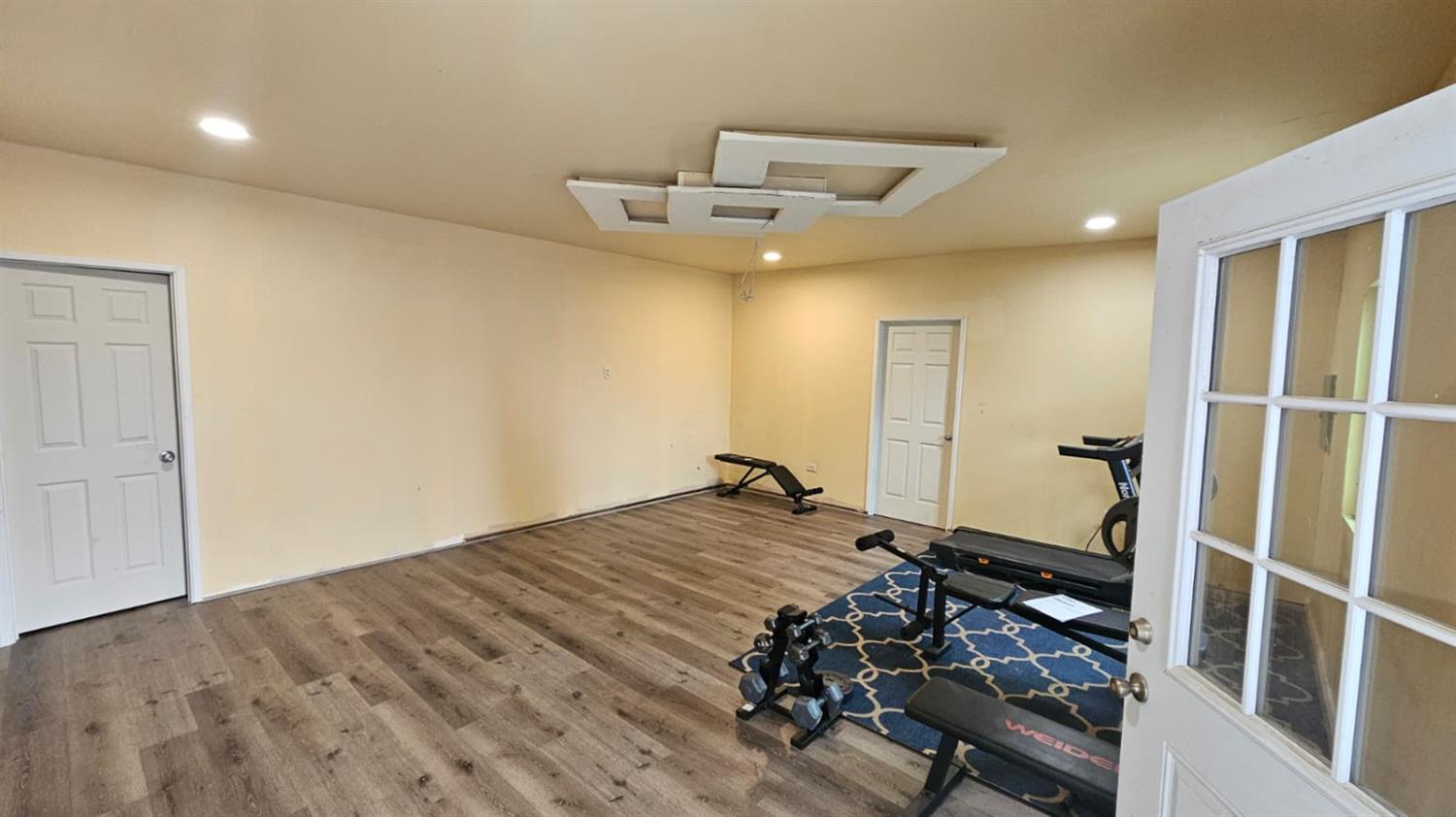 11881 Griffith Road Turlock, CA 95380 - Photo 21 of 42 a view of a room with gym equipment