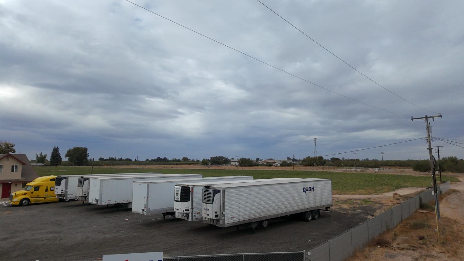 11881 Griffith Road Turlock, CA 95380 - Photo 38 of 42 an aerial view of a house with a garden and lake view