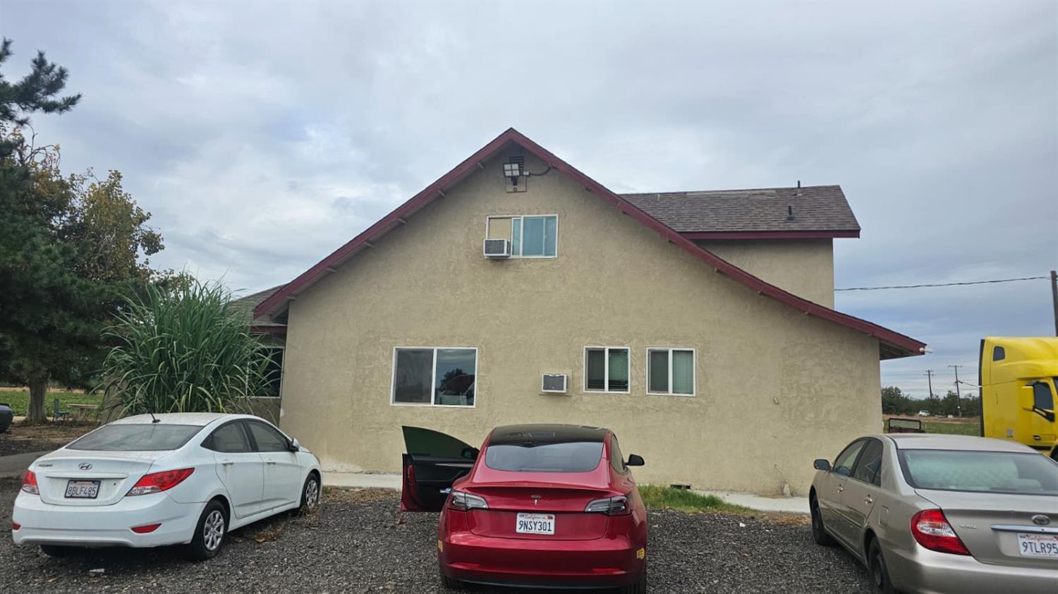 11881 Griffith Road Turlock, CA 95380 - Photo 5 of 42 a car parked in front of a house