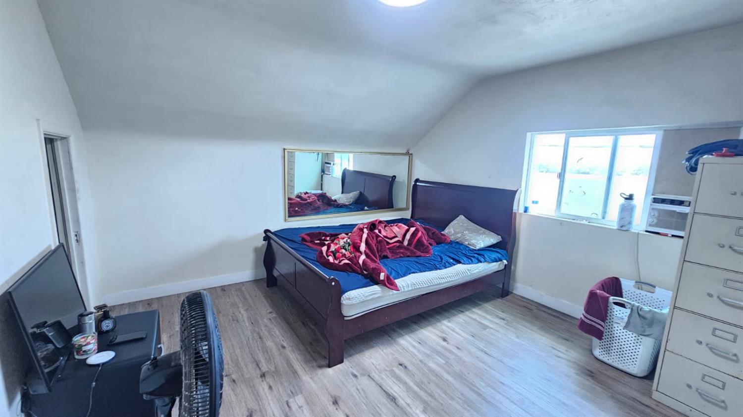11881 Griffith Road Turlock, CA 95380 - Photo 6 of 42 a living room with furniture and a wooden floor