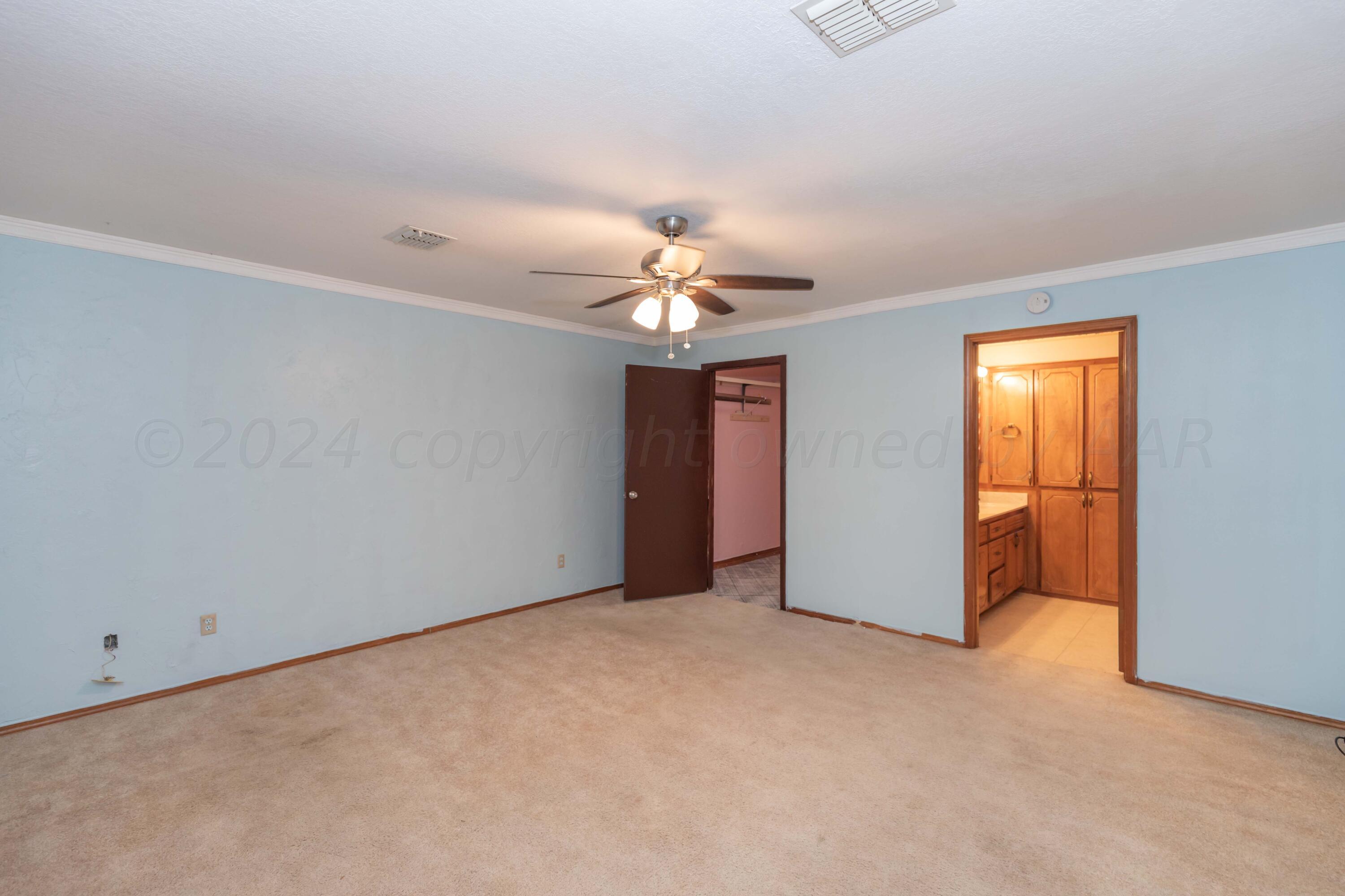 3406 Gladstone Lane Amarillo, TX 79121 - Photo 17 of 35 a view of an empty room with a window