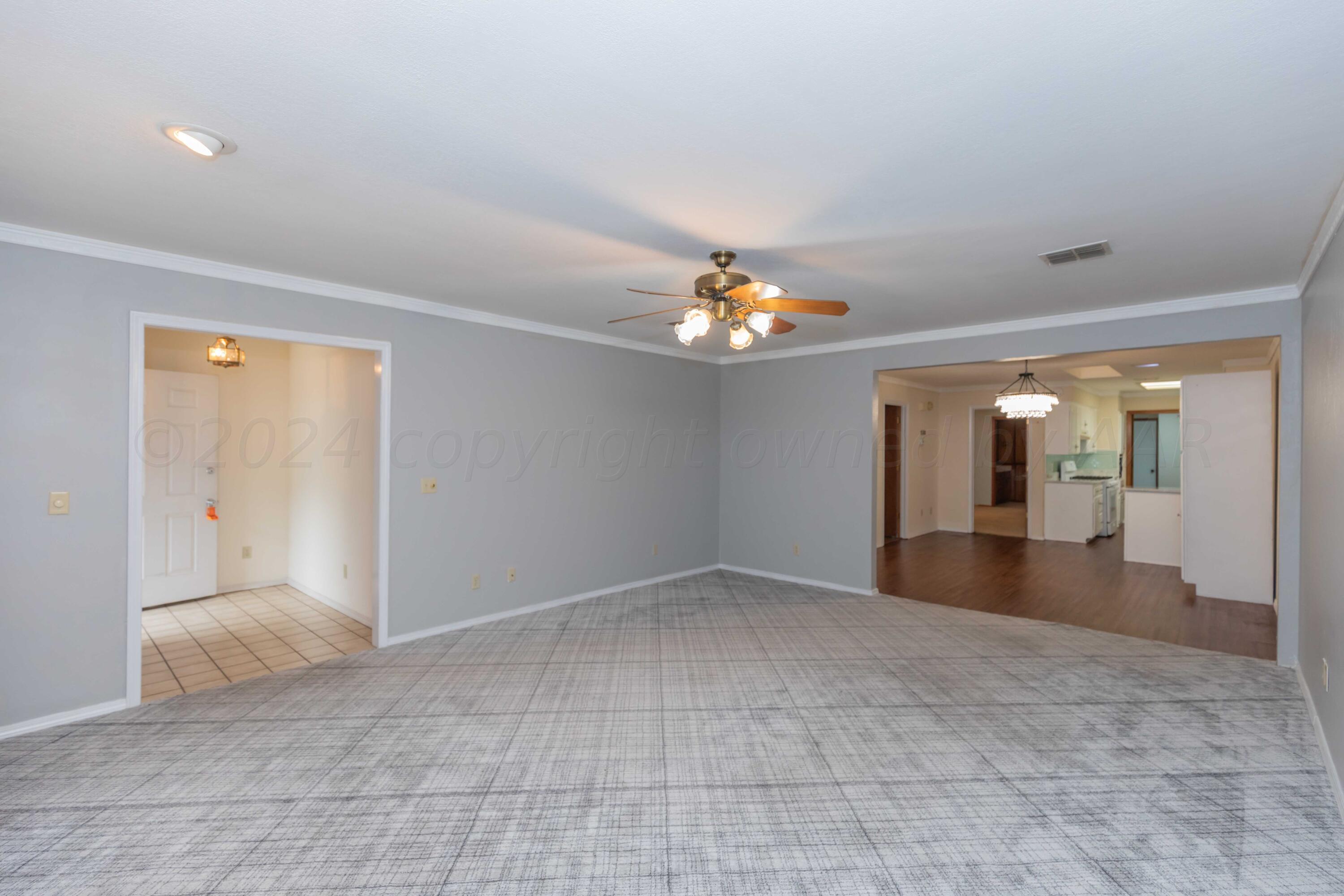 3406 Gladstone Lane Amarillo, TX 79121 - Photo 7 of 35 a view of livingroom with window
