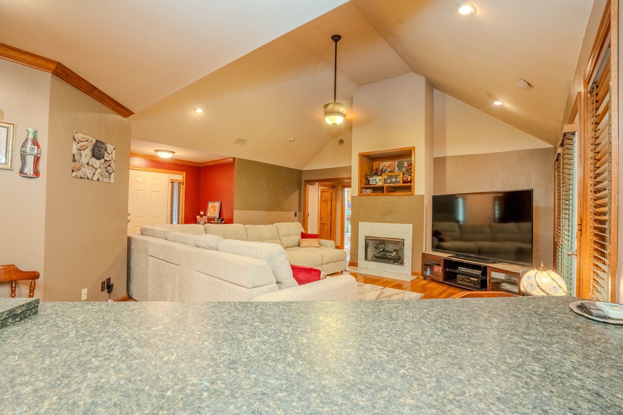 410 Britton Hollow Road Pulaski, TN 38478 - Photo 15 of 74 a living room with fireplace furniture and a flat screen tv