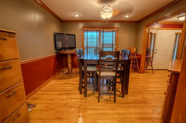 a bedroom with a bed and a tv in it