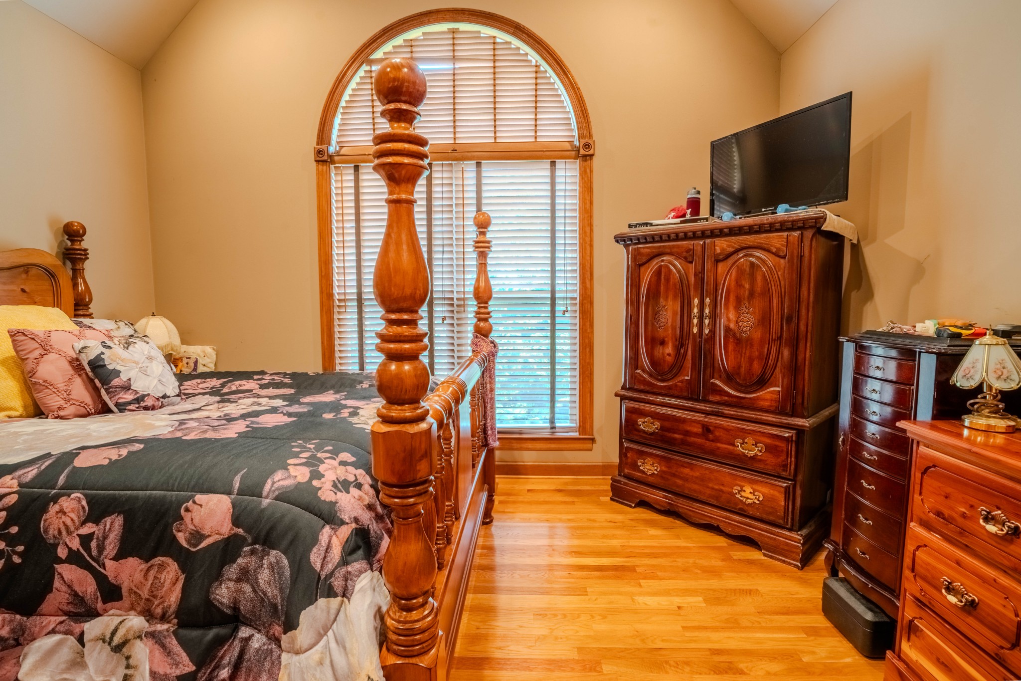 410 Britton Hollow Road Pulaski, TN 38478 - Photo 20 of 74 a bedroom with a bed and flat screen tv