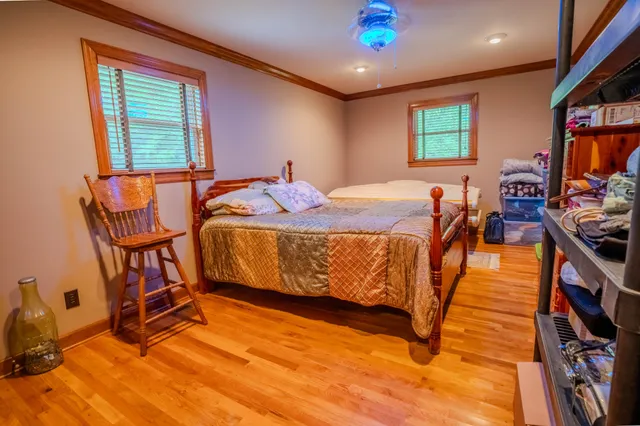 a view of kitchen with stainless steel appliances granite countertop cabinets and a refrigerator