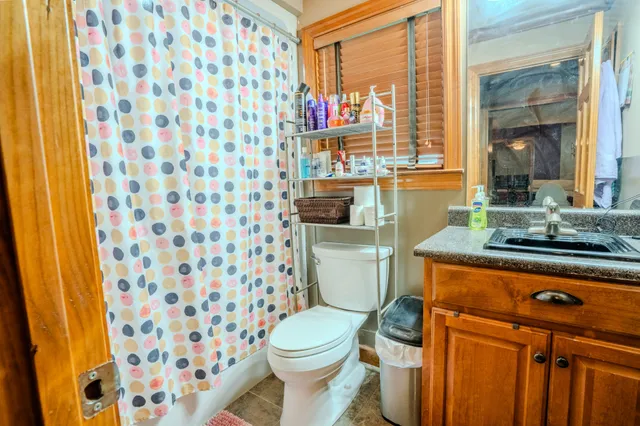 a utility room with dryer washer and other items
