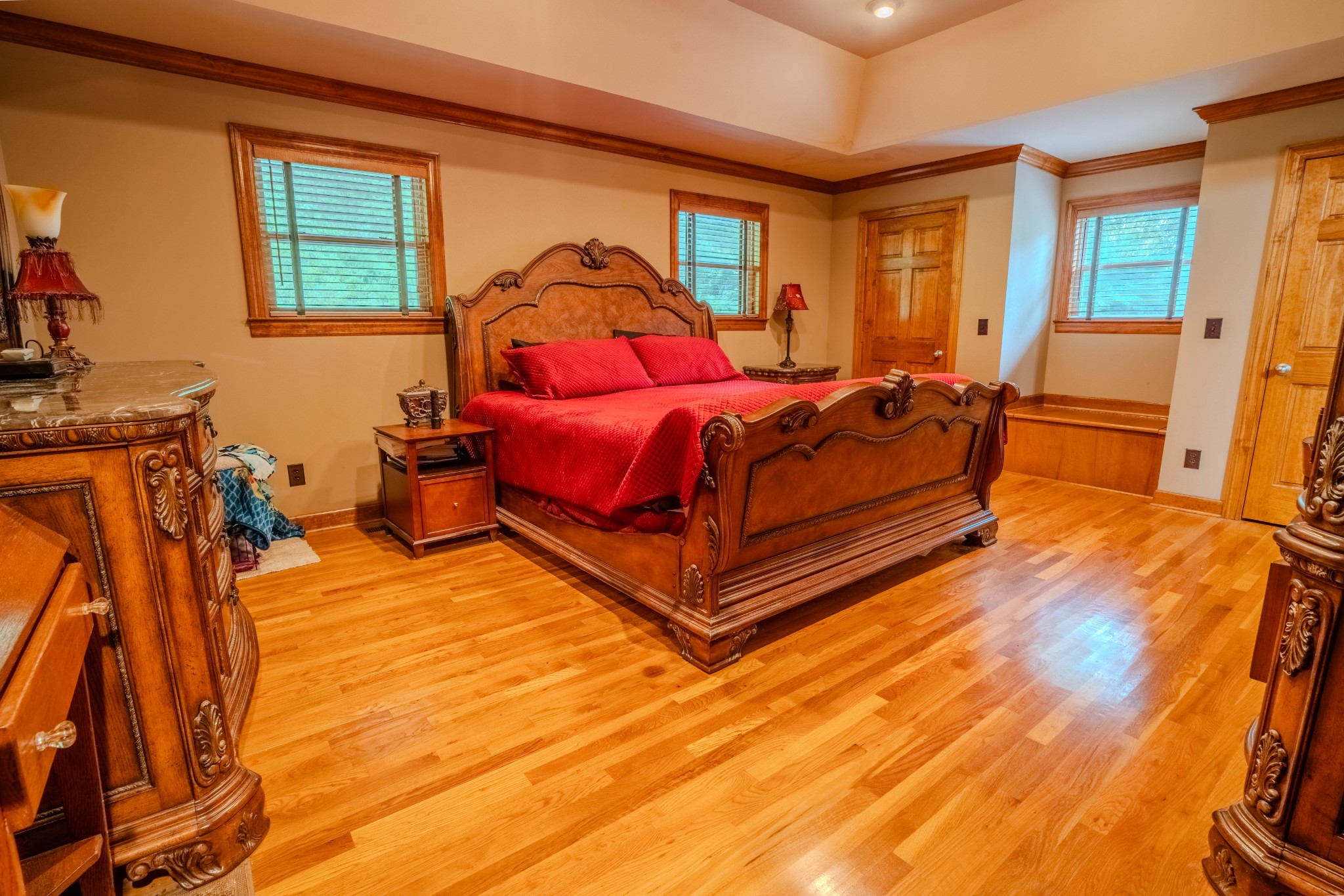 410 Britton Hollow Road Pulaski, TN 38478 - Photo 25 of 74 a bedroom with a bed and wooden floor