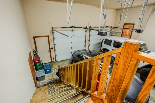 a view of an empty room with wooden walls
