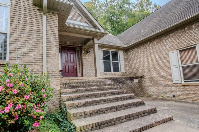 a view of outdoor space with deck and yard