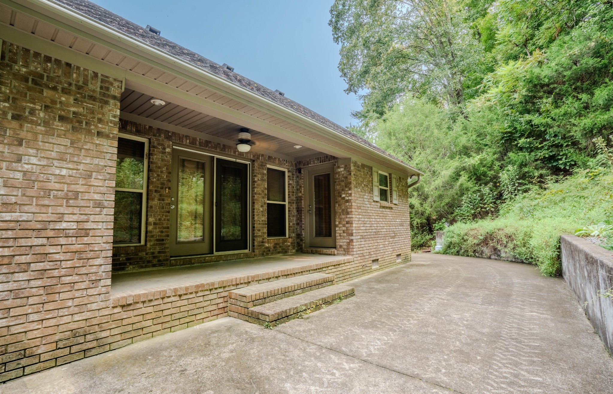 410 Britton Hollow Road Pulaski, TN 38478 - Photo 36 of 74 a view of a house with a patio