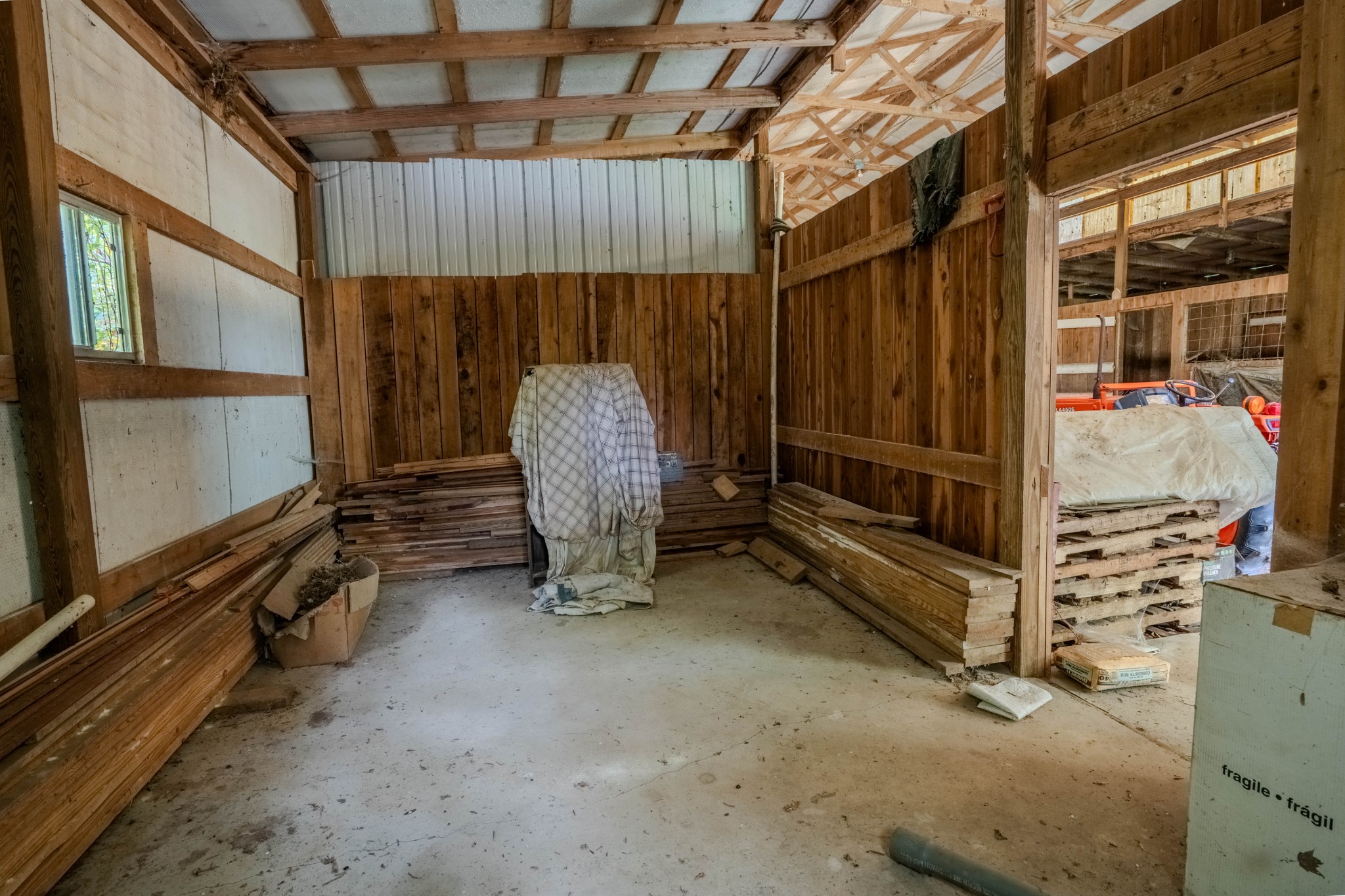 410 Britton Hollow Road Pulaski, TN 38478 - Photo 47 of 74 a view of an empty room with wooden walls