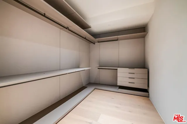 a view of an empty walk in closet