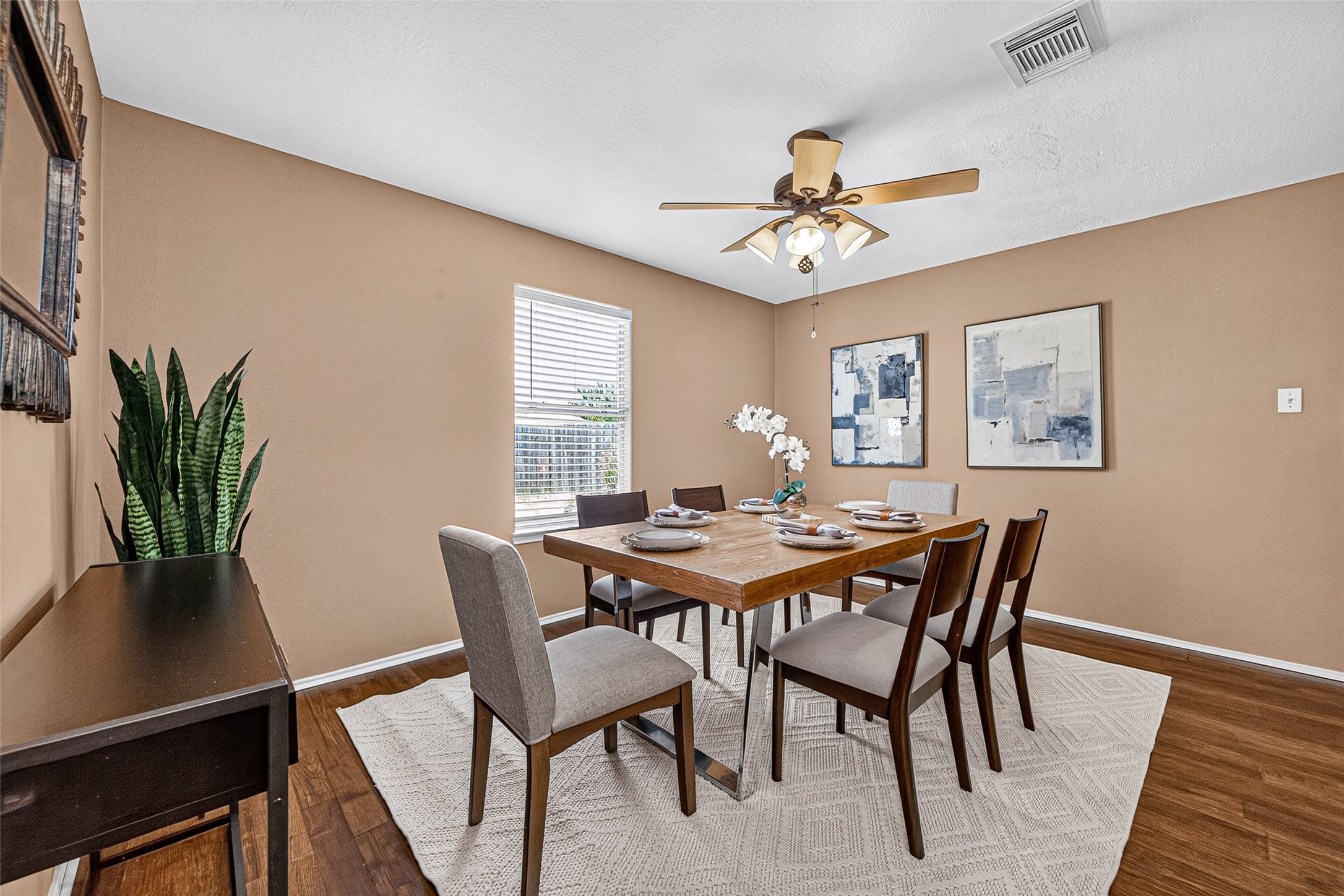 6822 Baron Gate Court Spring, TX 77379 - Photo 8 of 49 Elegant formal dining room ready for hosting your next dinner party.