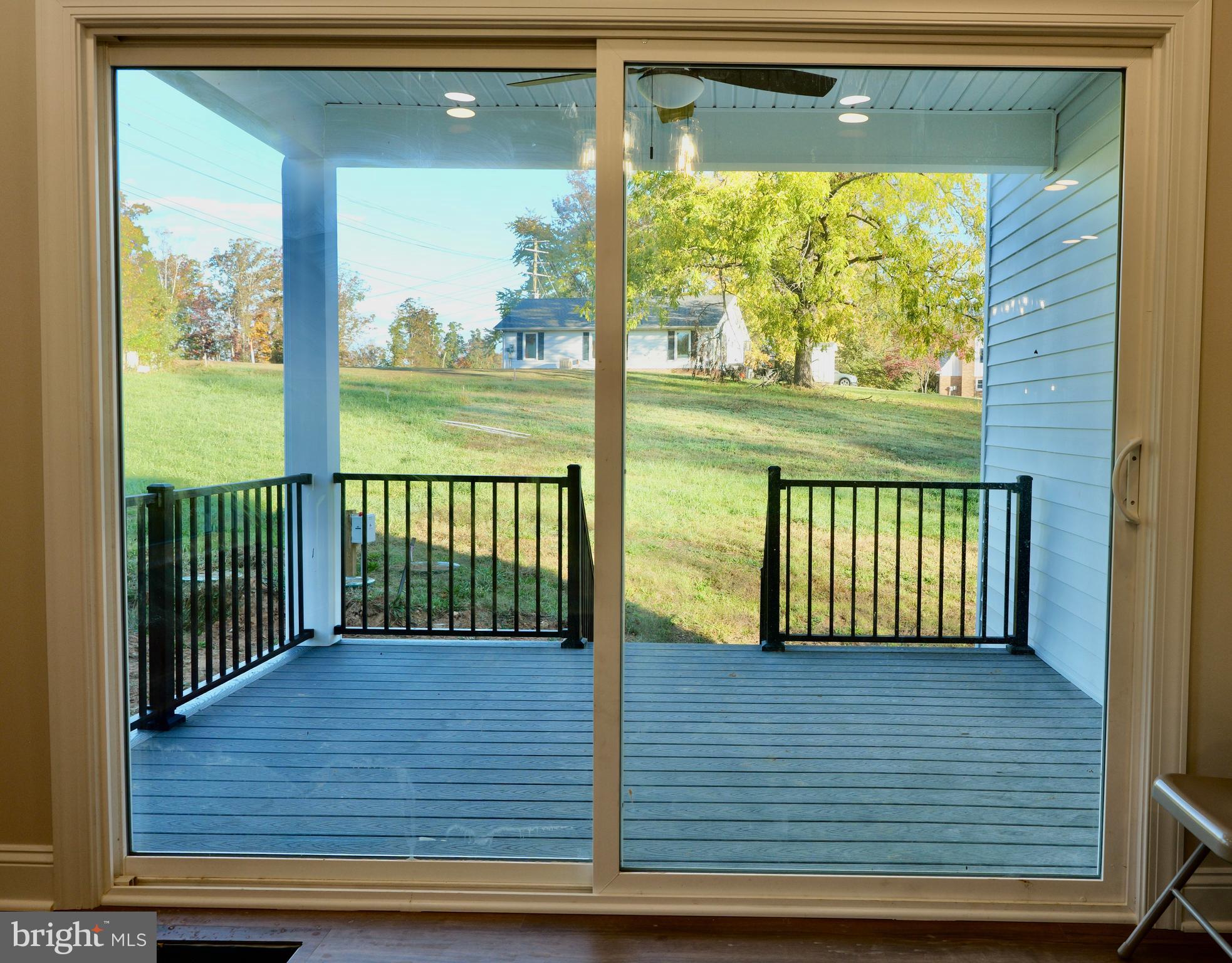8028 Pinnacle Ridge Drive Manassas, VA 20112 - Photo 22 of 74 a view of a balcony with wooden floor
