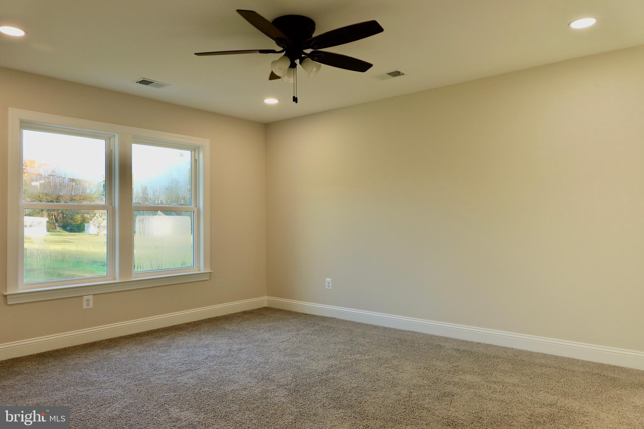 8028 Pinnacle Ridge Drive Manassas, VA 20112 - Photo 36 of 74 an empty room with a window