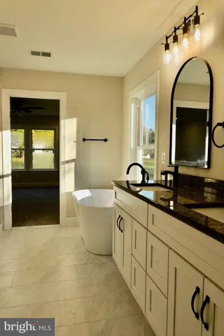 a view of a room that has a window in it