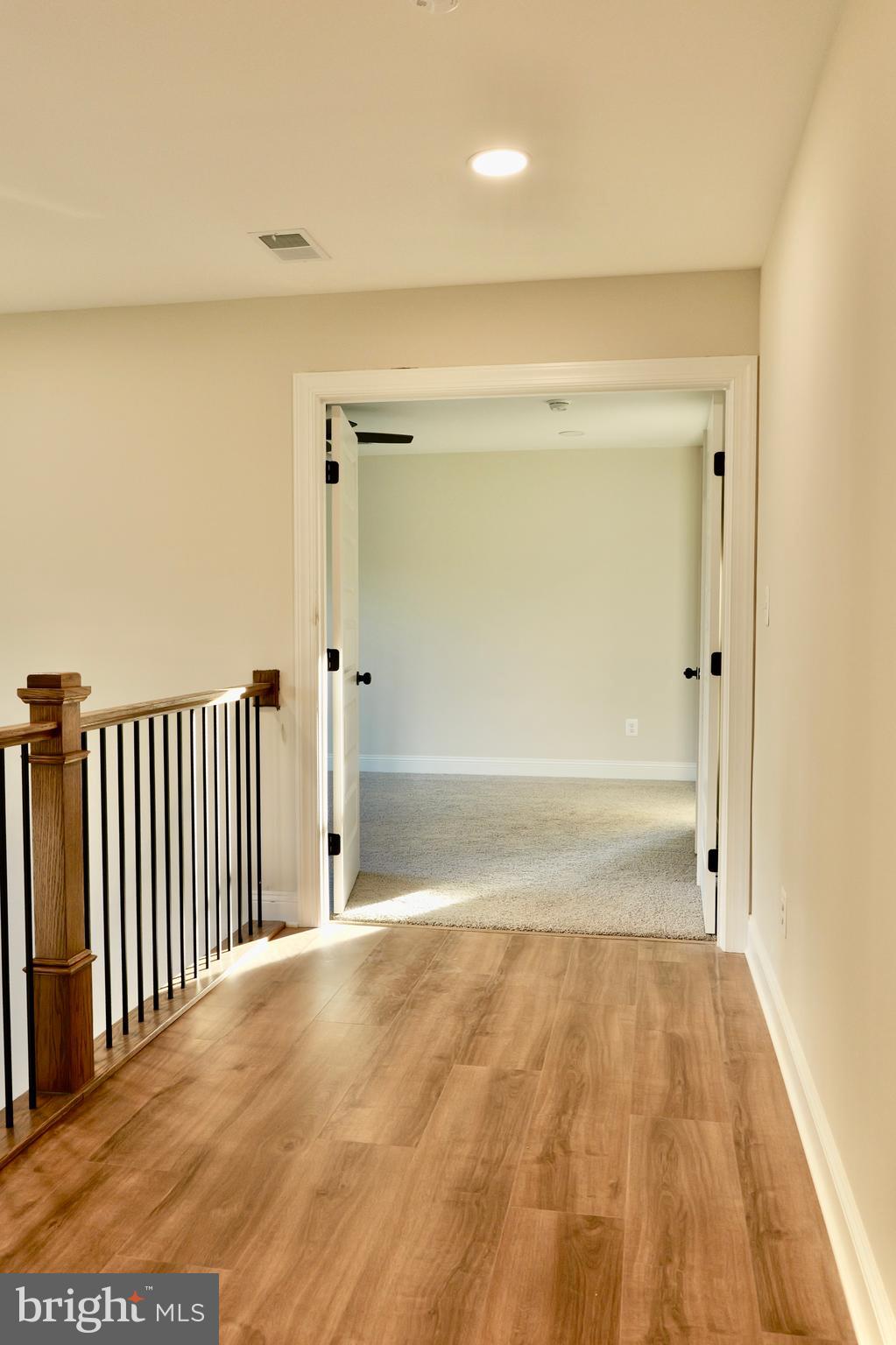8028 Pinnacle Ridge Drive Manassas, VA 20112 - Photo 57 of 74 a view of a big room with wooden floor