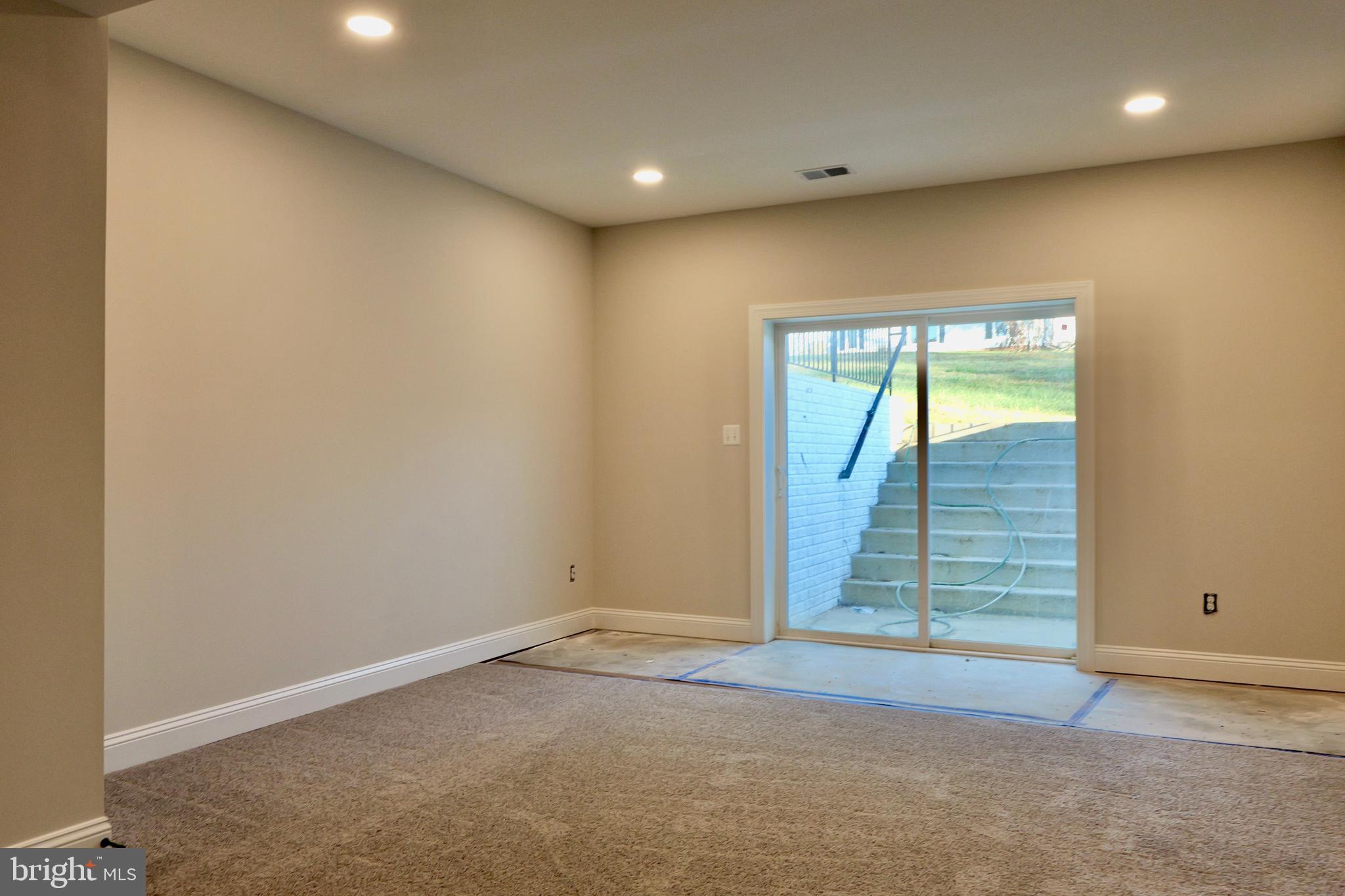 8028 Pinnacle Ridge Drive Manassas, VA 20112 - Photo 72 of 74 a view of an empty room with a window
