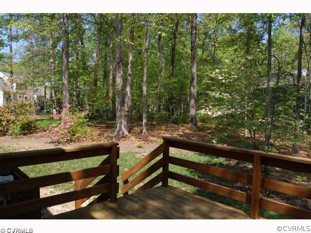 5015 Cedar Cliff Road Chester, VA 23831 - Photo 10 of 12 a view of a bench in a garden