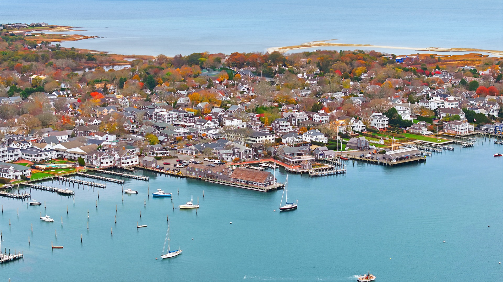 10 Pease Point Road Edgartown, MA 02539 - Photo 19 of 21 an aerial view of ocean and residential houses with outdoor space