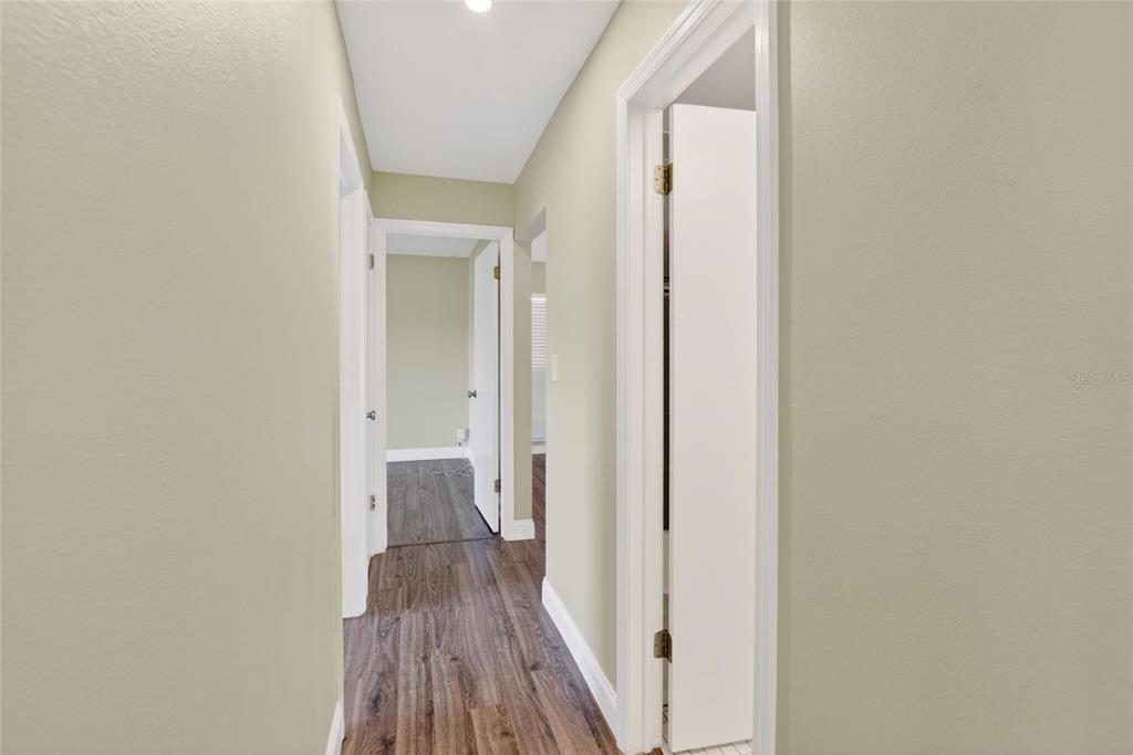 2340 Merrily Circle South Seffner, FL 33584 - Photo 31 of 52 a view of a room with wooden floor