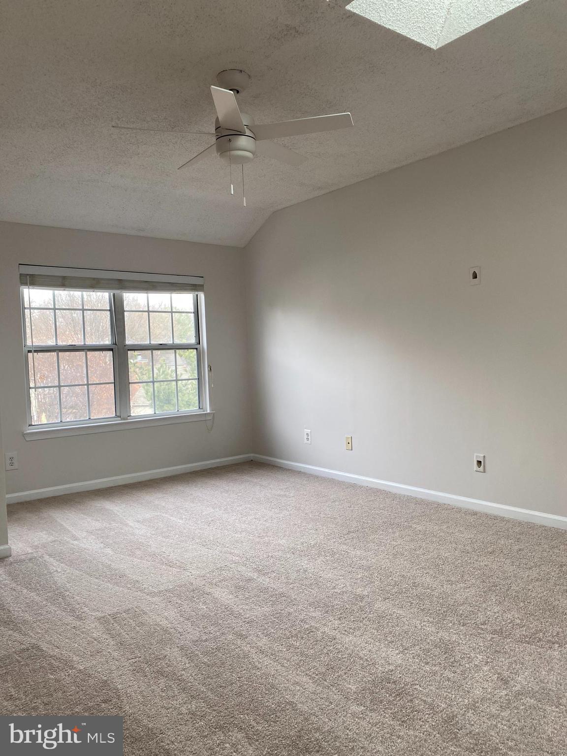 12106 Greenway Court, Unit 302 Fairfax, VA 22033 - Photo 18 of 20 a view of an empty room with a window