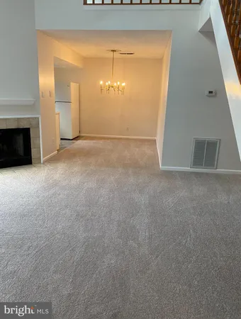 a view of a livingroom with a fireplace