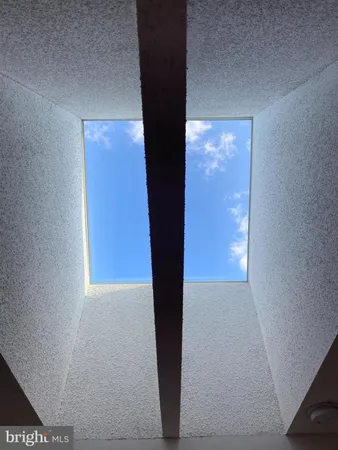 a kitchen with a sink cabinets and appliances