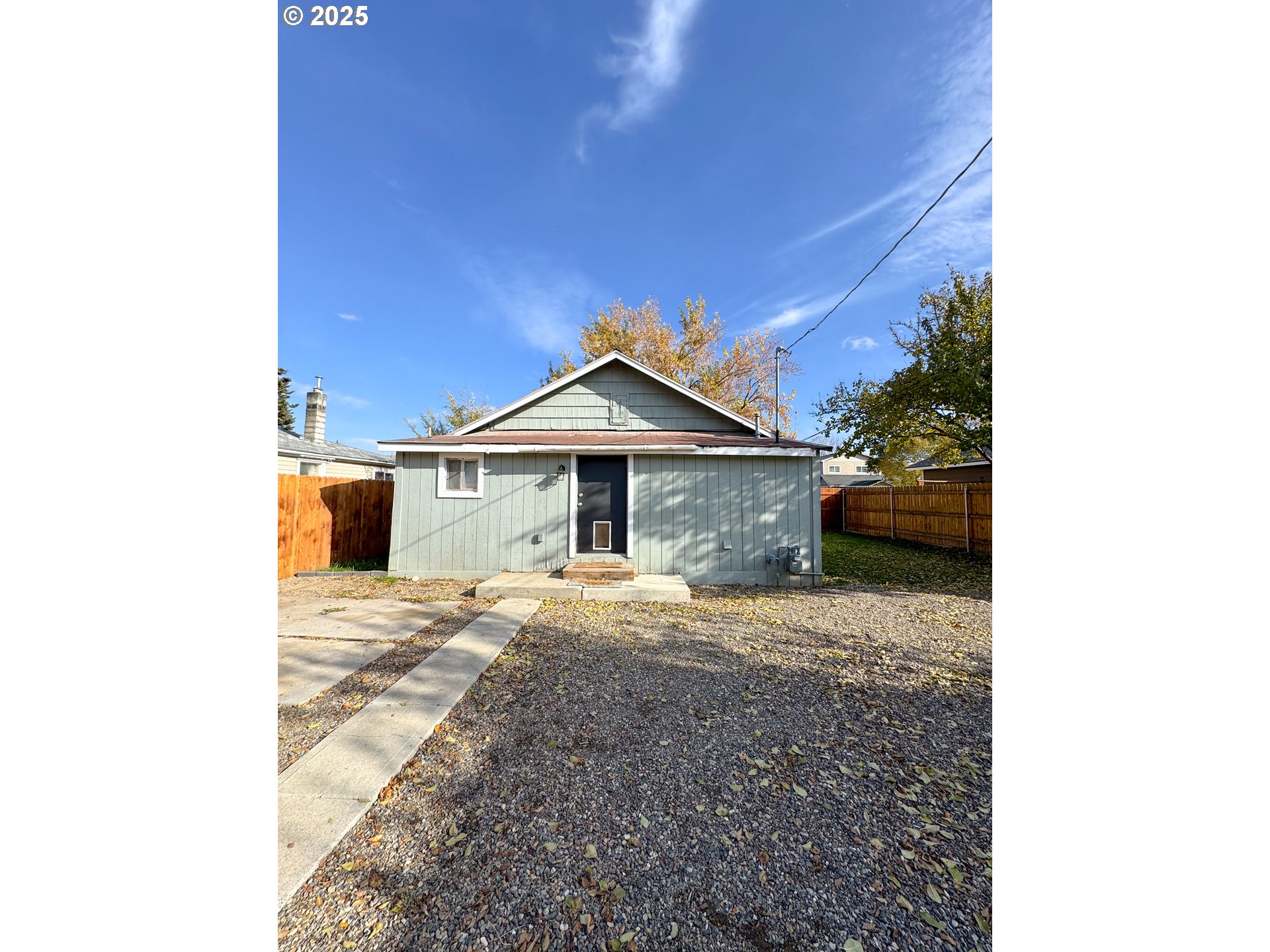 971 Walnut Street Baker City, OR 97814 - Photo 18 of 19 a front view of a house with a yard