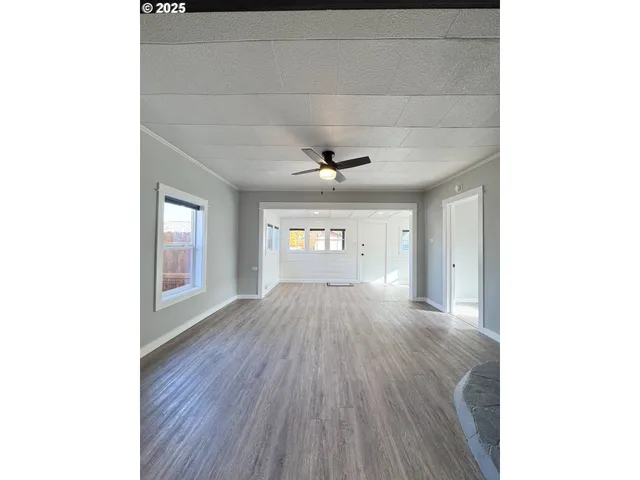 a view of an empty room and window