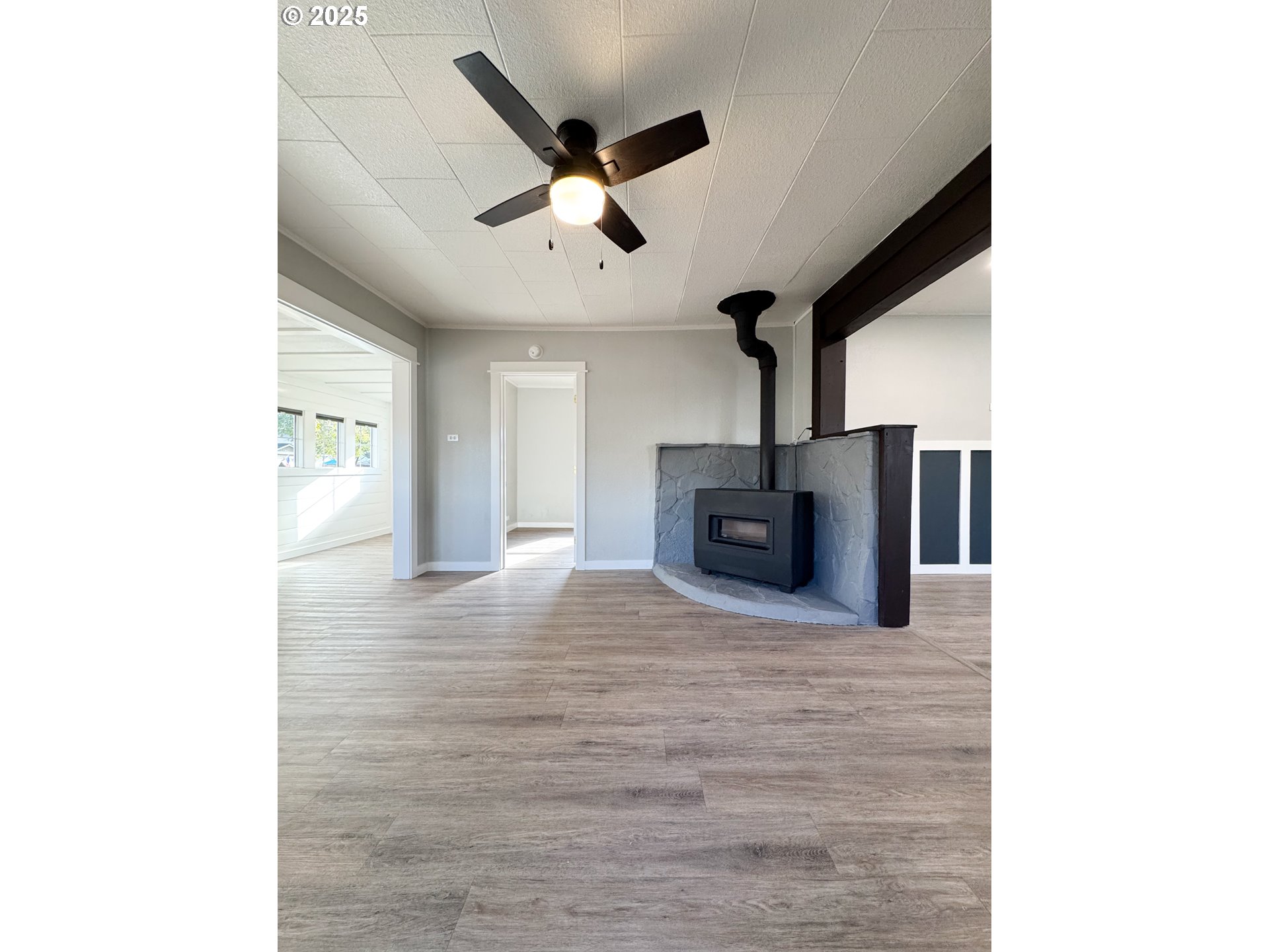 971 Walnut Street Baker City, OR 97814 - Photo 4 of 19 a view of a livingroom with a flat screen tv