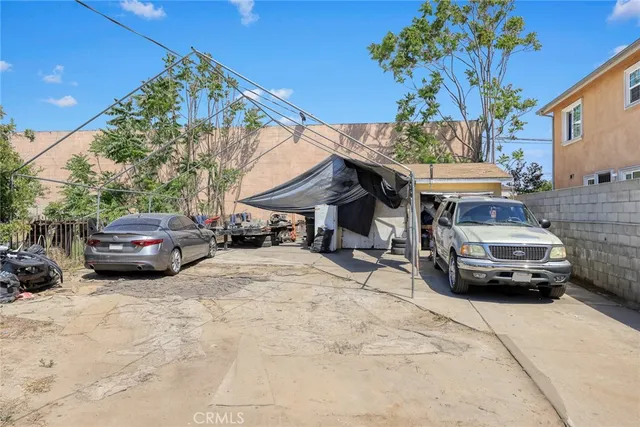 a view of a car parked in front of house