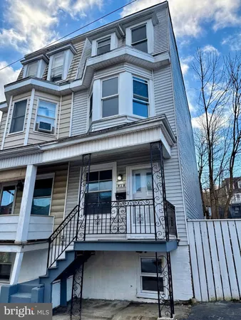 a front view of a house with a balcony