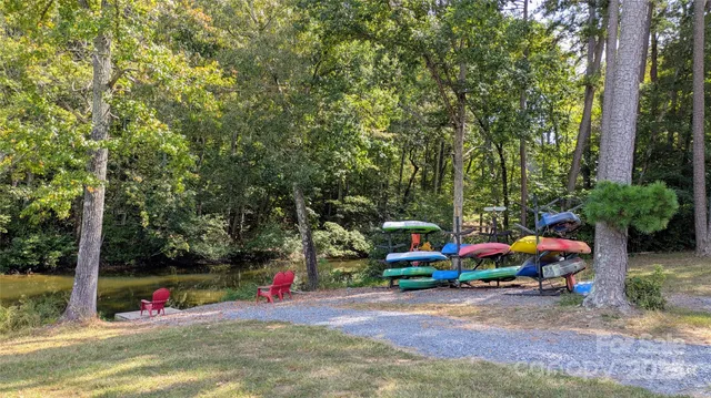 a view of water heater and covered with wooden floor