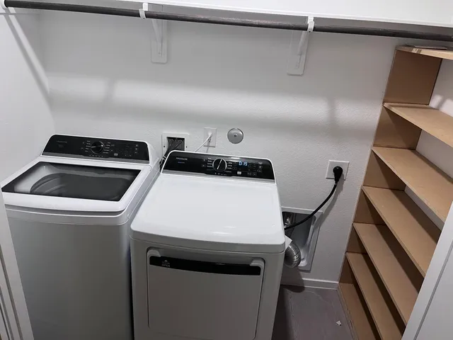 a bathroom with a toilet and a sink