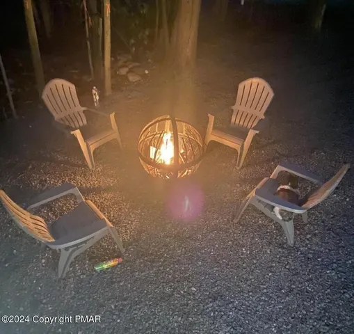 a sign that is in front of flowers