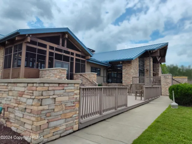 a childrens park with lots of swings and slides