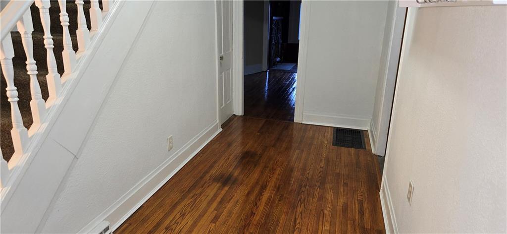 64 Old Rte 36 Road Punxsutawney, PA 15767 - Photo 3 of 12 a view of a hallway with wooden floor