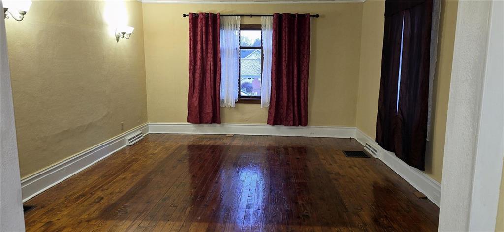 64 Old Rte 36 Road Punxsutawney, PA 15767 - Photo 6 of 12 a view of a hallway with wooden floor and a window